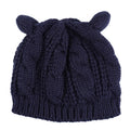 Hand made 3D cat ear knitted wool beanie in winter colours on head model