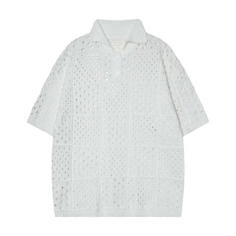 Man's black short-sleeved polo shirt with a hollow-knit texture and a loose, cardigan-style fit.