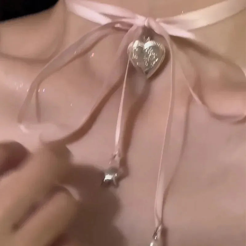 Women's electroplated alloy necklace with ribbon and love pendant on clavicle chain