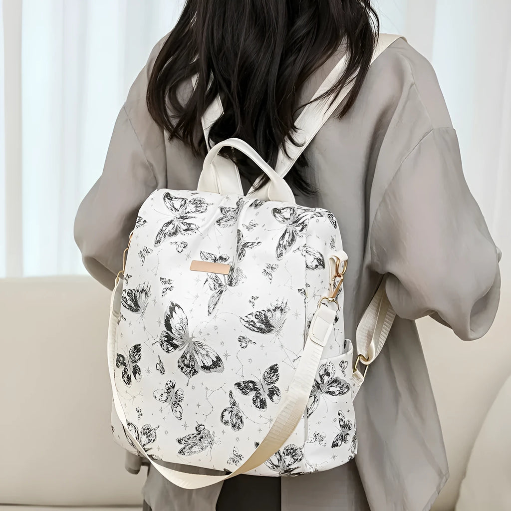 Butterfly print PU backpack in multiple colours with breathable back system and large capacity under 20 litres.