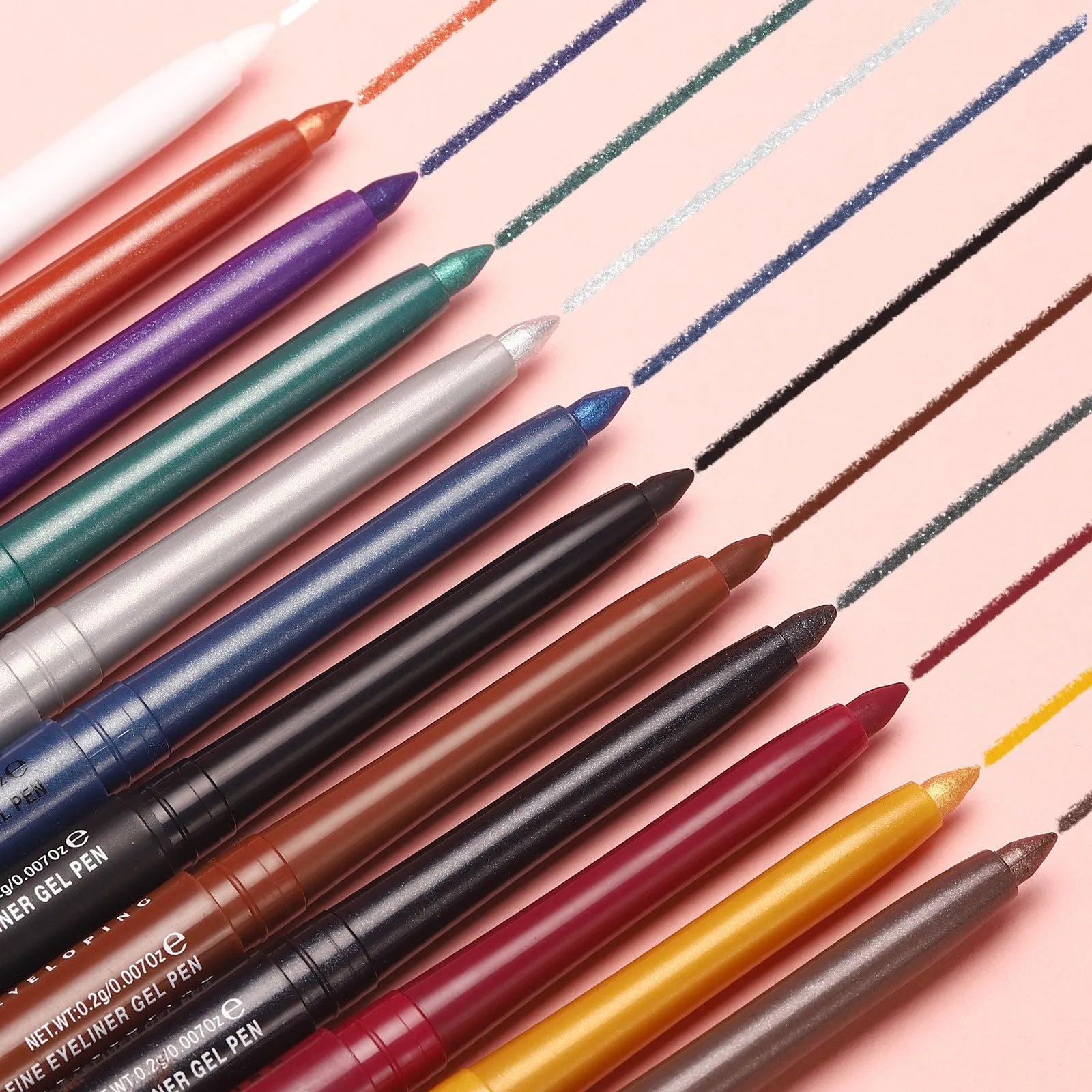 12 colourful gel glitter eyeliner pencils with various shades arranged in a set