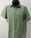 Men's loose fit short sleeve linen shirt in apricot colour on a hanger.