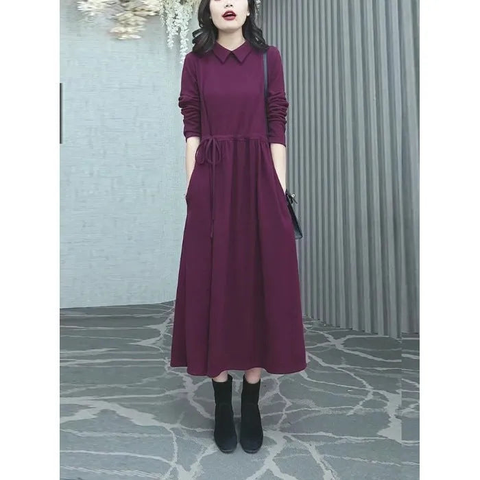Purplish red long sleeve plus size dress for women, urban winter commute style.