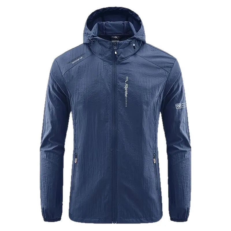 Man wearing a lightweight grey hooded summer jacket made from thin nylon fabric.