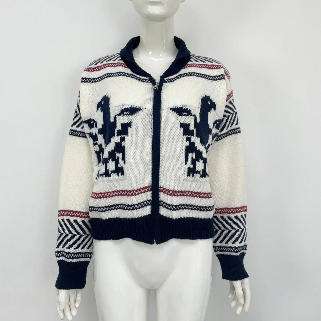 White women's zip cardigan with lapel collar and jacquard contrast colour stripes laid flat.