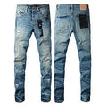 Men's black slim fit skinny jeans with a straight leg and cardigan button detail on the fly.