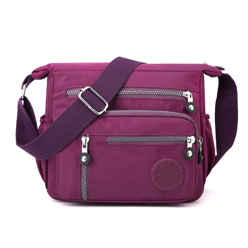 Nylon messenger bag with single shoulder strap in square vertical shape