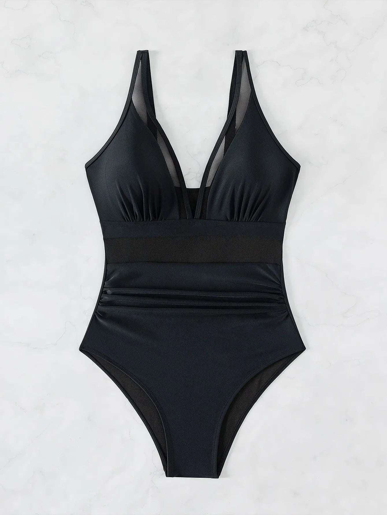 Black women's one-piece halter swimsuit with mesh detailing and brief-style bottom.