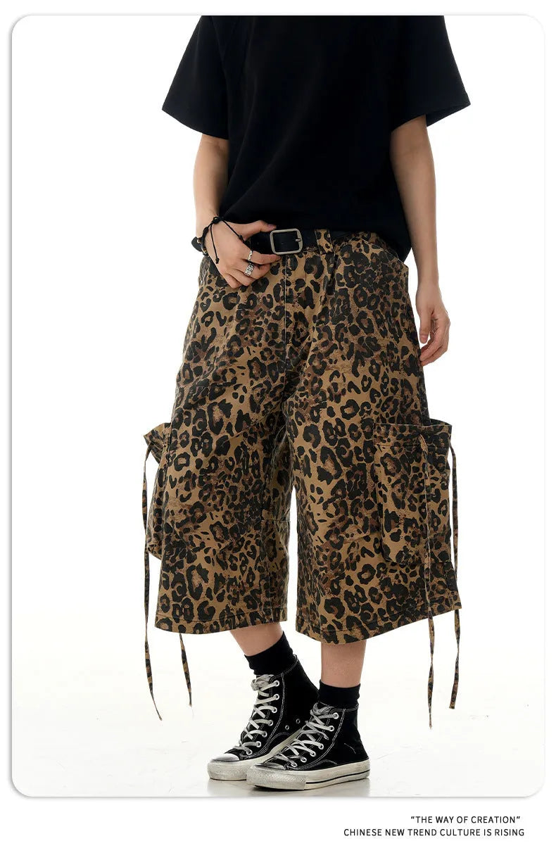 Leopard print women's trousers with high waist, button fly, and cropped straight-leg design