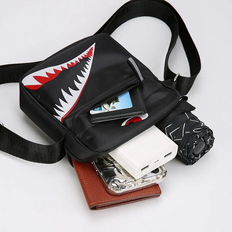 Men's small black crossbody bag with animal print pattern and multiple compartments