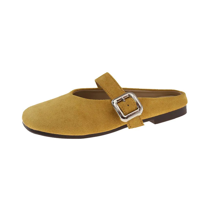 Women's flat closed toe half slipper in apricot colour with square toe and rubber sole.