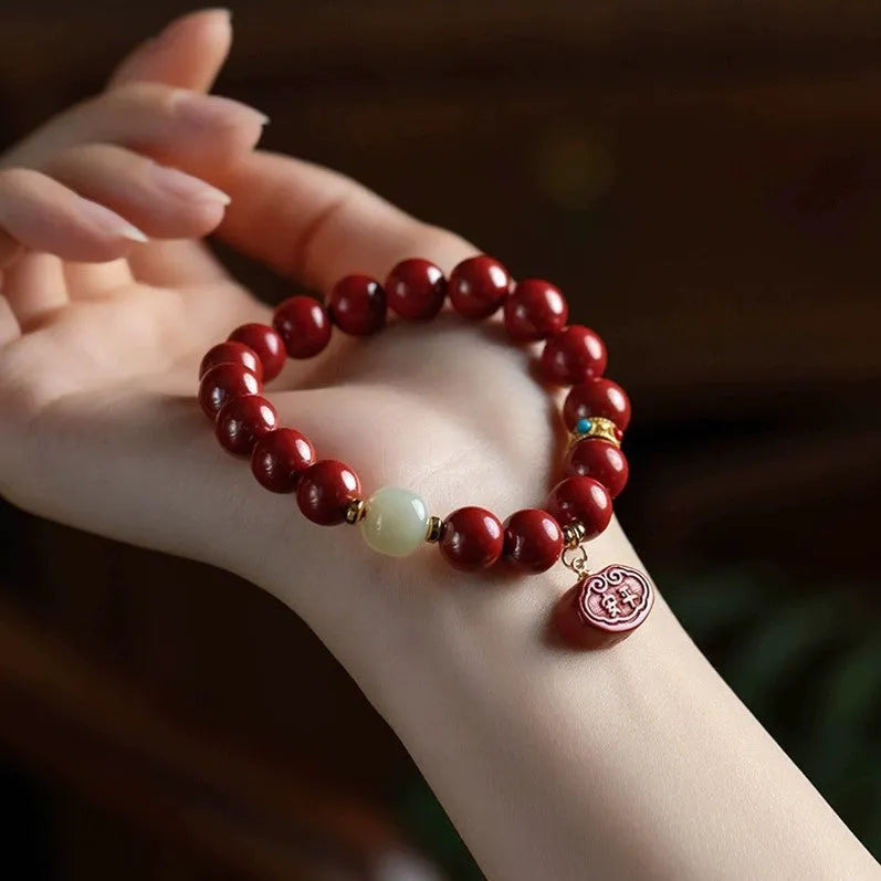 Natural cinnabar bracelet with Emperor Sandstone design in 8mm and 10mm sizes