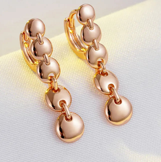 Gold-coloured retro long round circle earrings with woven texture on copper base