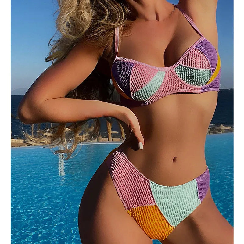 Ladies' polyester bikini top with steel bracket support and push-up cups in colour matching option