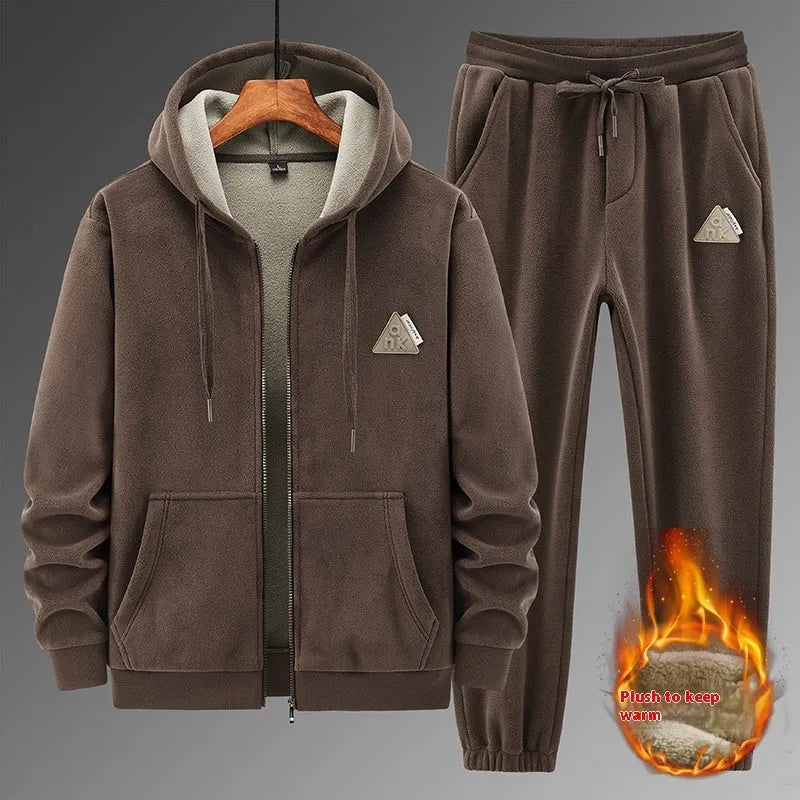 Grey cashmere hooded sports suit with cotton pants laid flat.