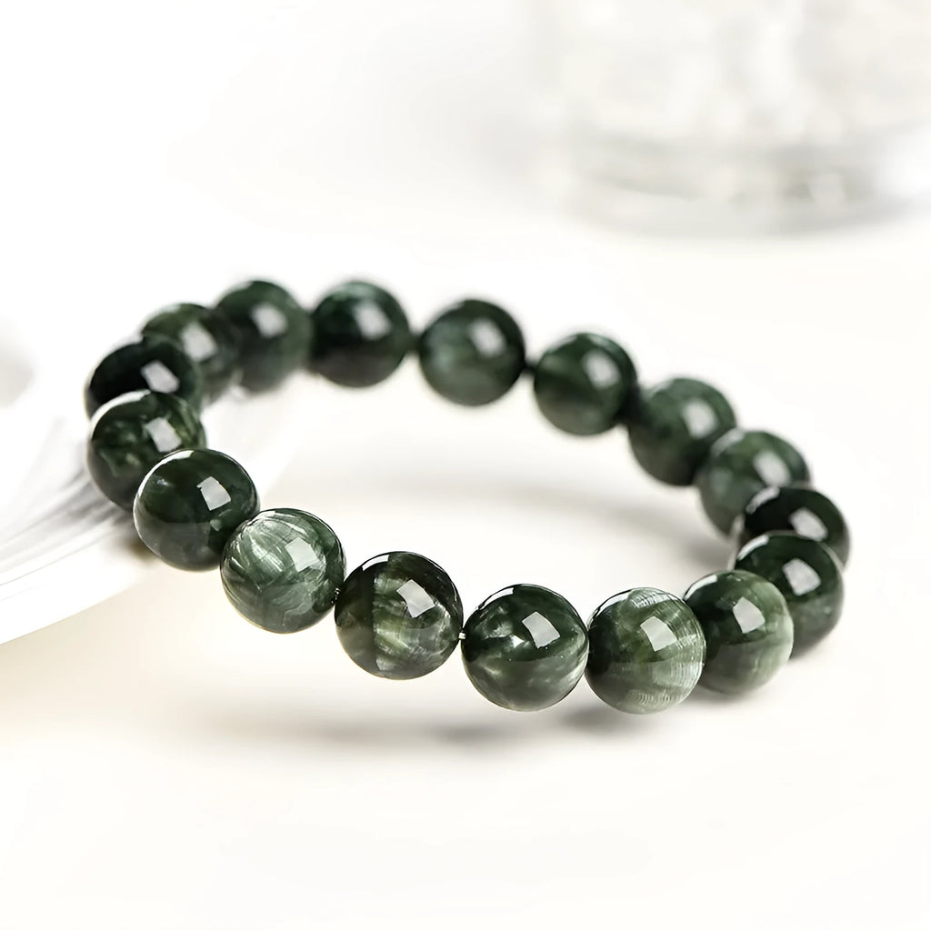 Natural green Grade 7A Green Dragon Crystal bracelet with 8-9mm round beads and Ruyi elements