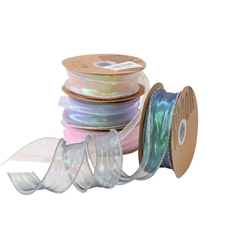 Mesh fishtail yarn ribbon with colourful wave edge in multiple illusion colour options for DIY craft projects.