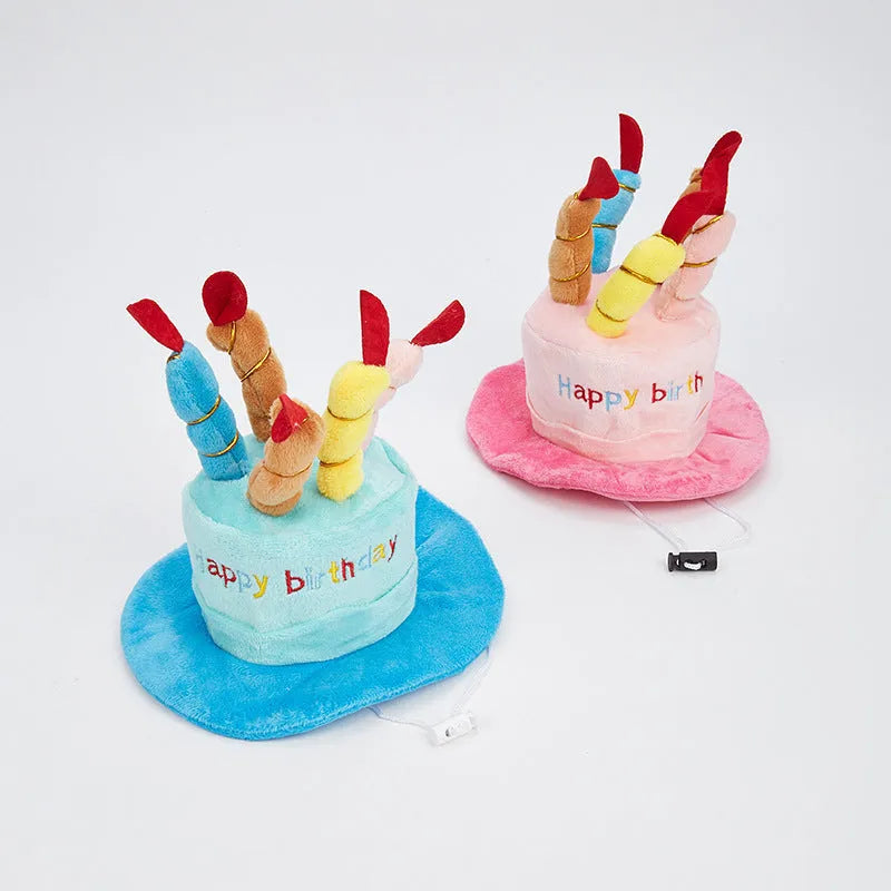 A blue or pink birthday hat for small dogs, shown with dimensions of 21cm by 15cm.