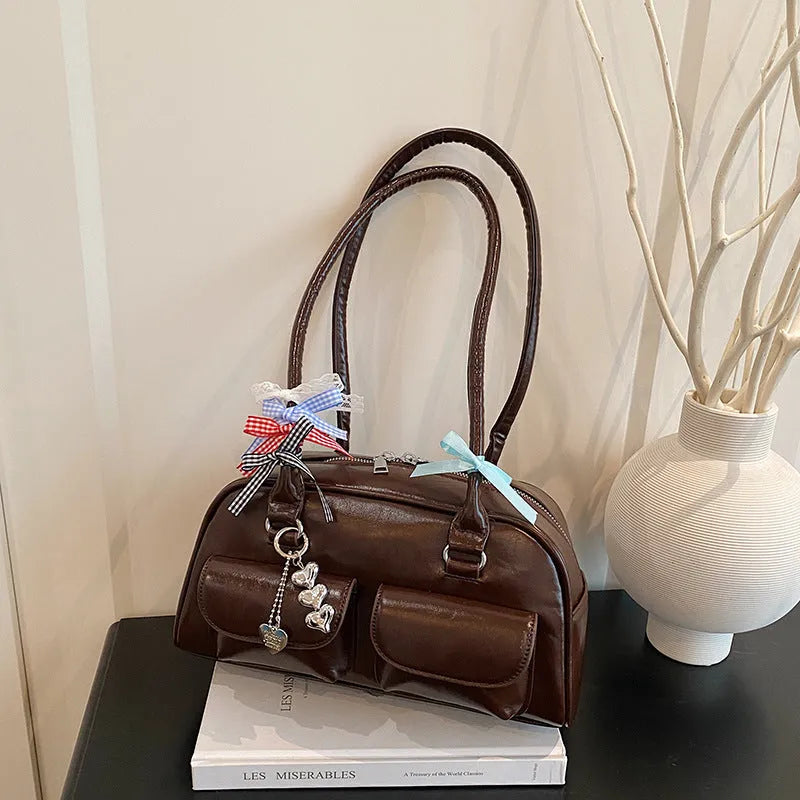 PU leather women's pillow handbag with flap closure and double shoulder straps in retro design