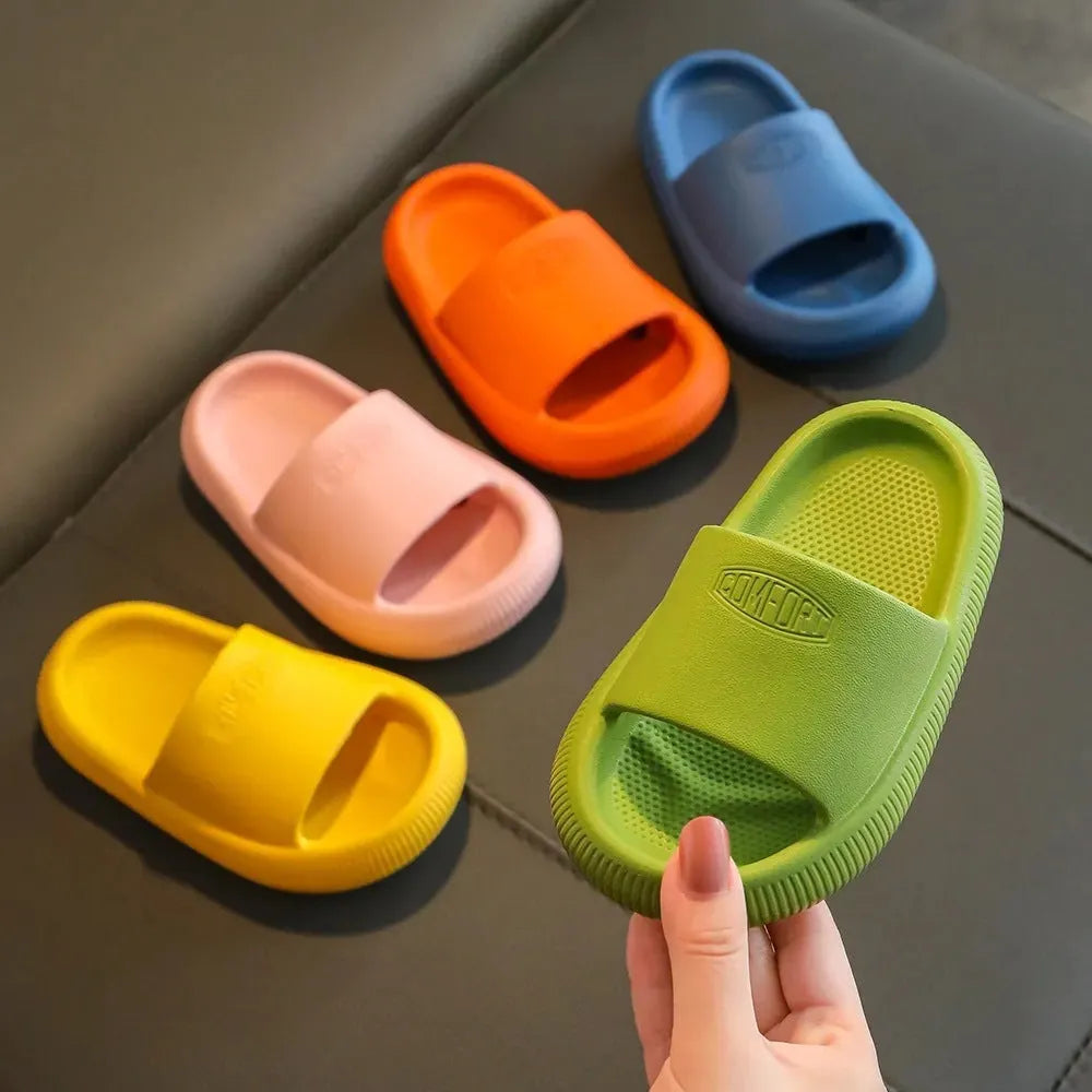 Children's EVA slippers in bright colours with non-slip soles showing size range options