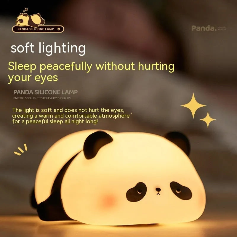 Cartoon panda-shaped night light with soft white glow on dark surface