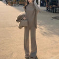 Women's casual acrylic fibre sweater and wide leg pants two-piece set in a solid colour.
