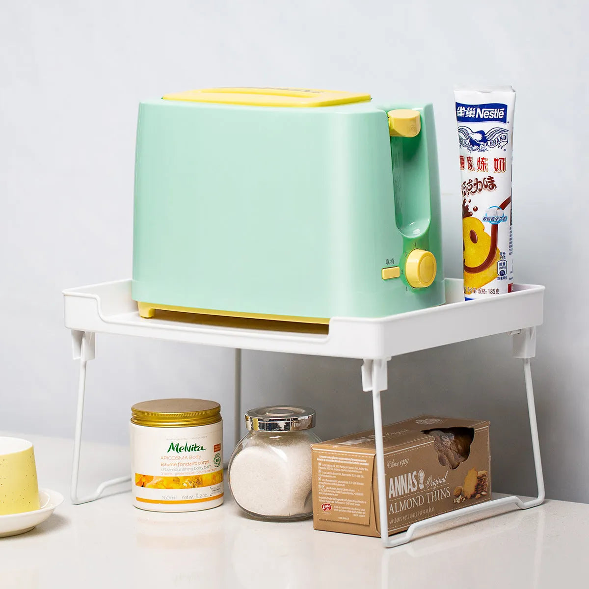 Transparent or white plastic kitchen supplies rack for countertop, cupboard and desktop organisation