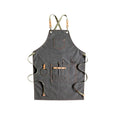 Cross-back canvas apron in camel colour with adjustable straps for café and baking work