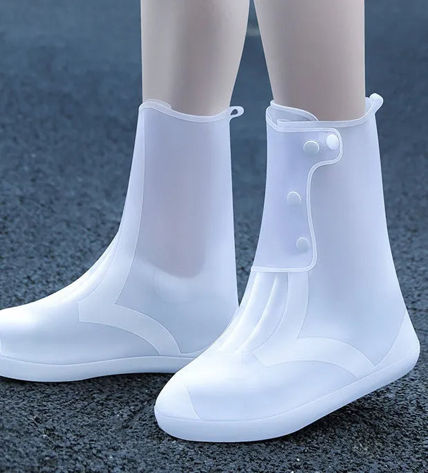 Women's white PVC high top water resistant shoe covers with anti-skid sole