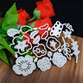 Silver carbon steel paper cutting die with floral plant design measuring 14.3 by 9.9 cm
