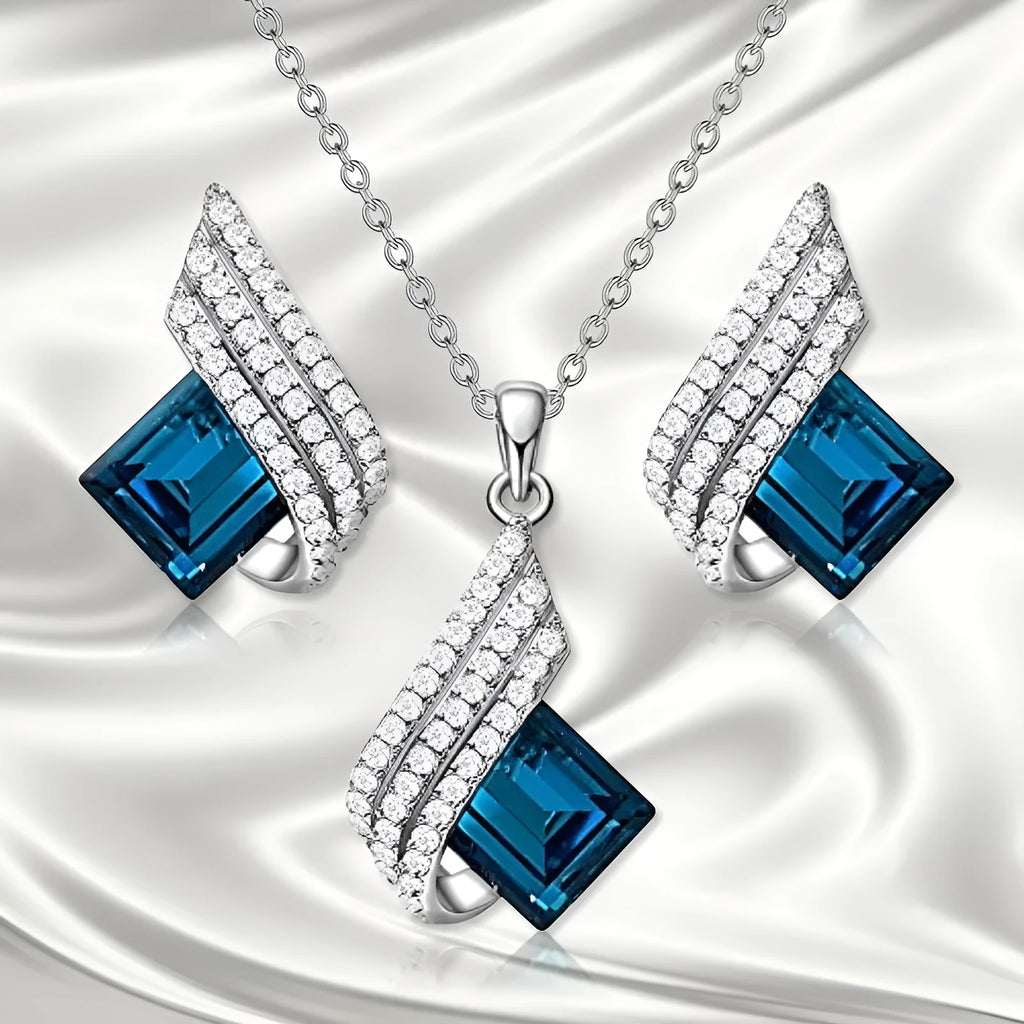 Glass and alloy necklace and earring set with cross chain design and electroplated metallic finish