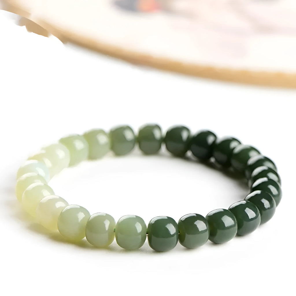 Natural Hetian jade bracelet with water gradient colour beads in two size options.