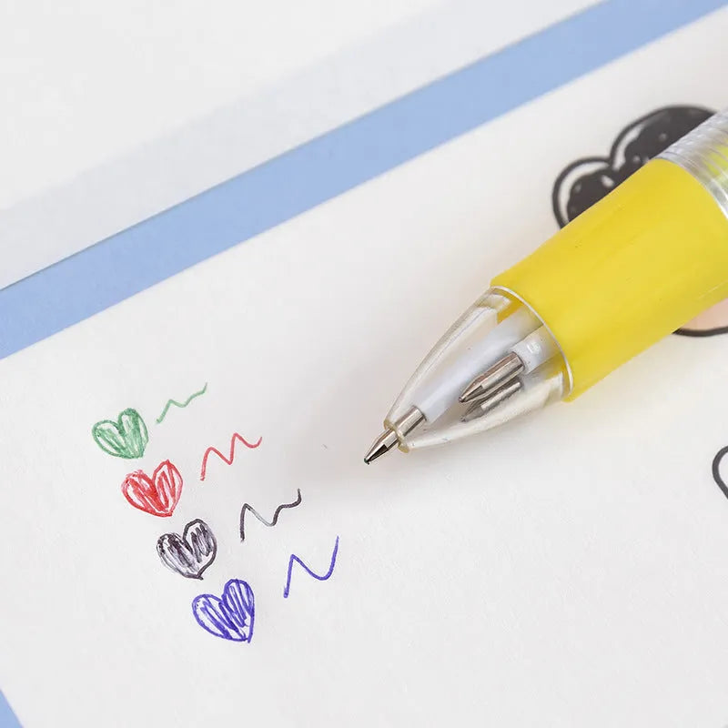 Cute cartoon four-colour press ballpoint pen with random design theme and 0.7mm tip.