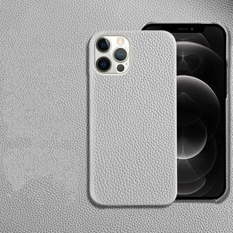 Genuine leather protective case for iPhone in simple half-break style on a table.