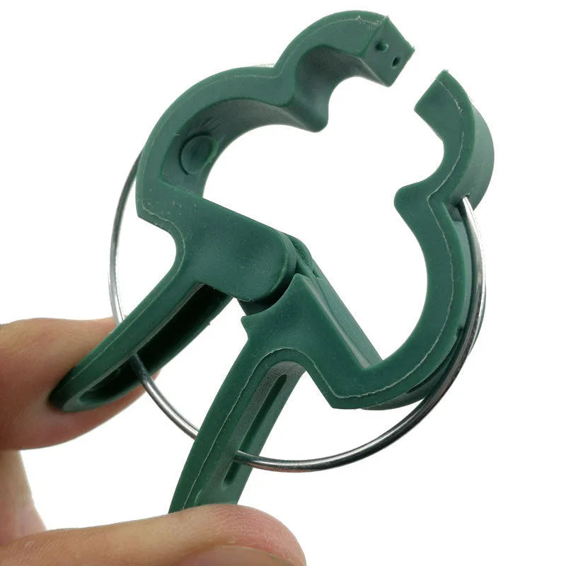 Green plant support clips in large and small sizes for climbing garden plants