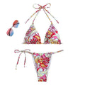 Multicolor printed women's triangle bikini top with hanging neck and matching bottoms.