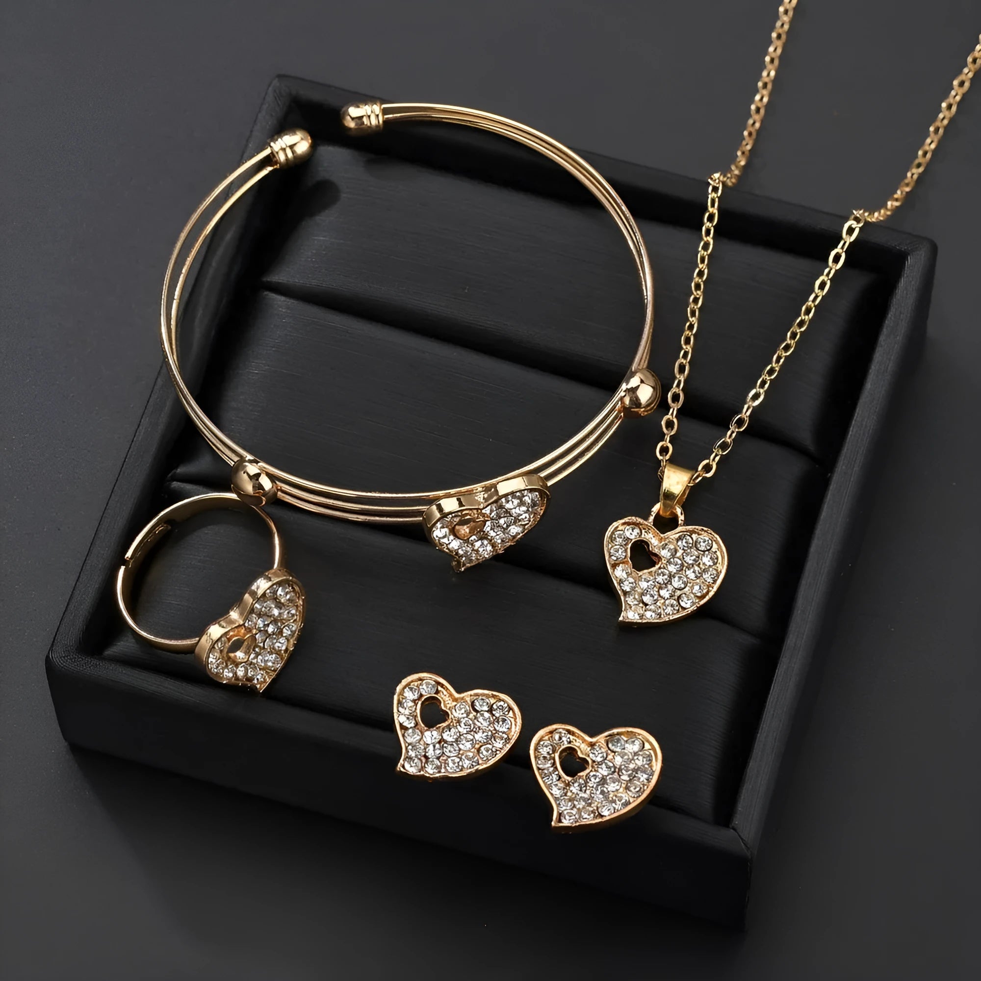Gold-coloured women's jewellery set with earrings, item decoration and hand decoration featuring love patterns