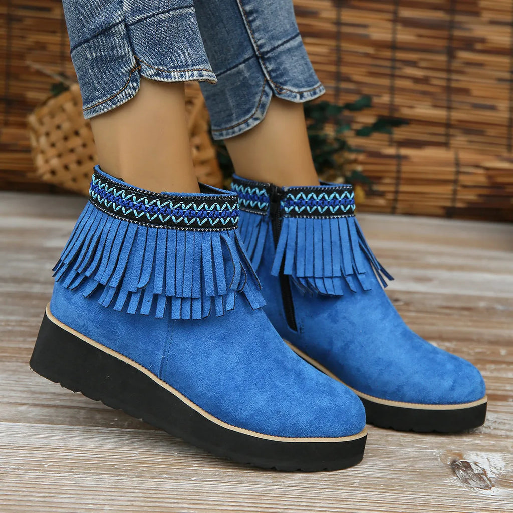 Dark brown suede women's wedge ankle boots with side zip and tassel on a waterproof platform sole.
