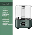 Green KC-112 touch screen humidifier with remote control on table