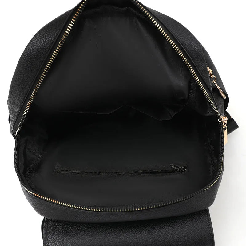Women's casual leather backpack in street style with three-dimensional pockets and adjustable straps