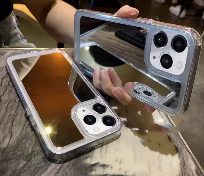 Silver mirror iPhone 15 protective case with soft rubber acrylic texture and makeup mirror element