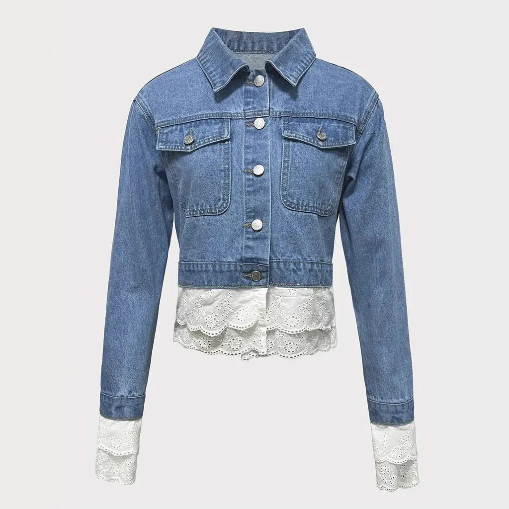Blue women's denim jacket with decorative lace stitching on the front, long sleeves.
