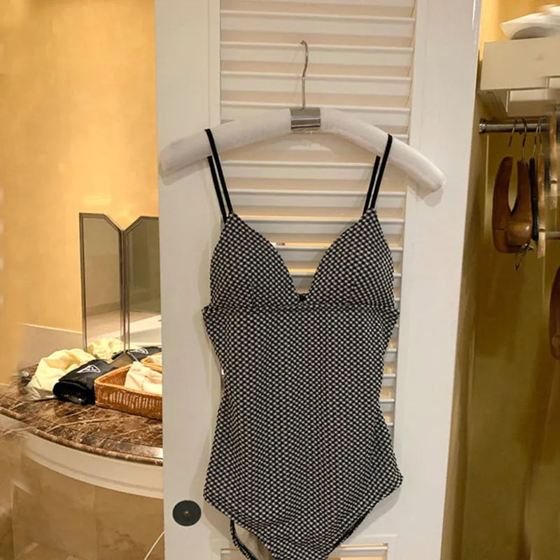 Blue one-piece swimsuit with high waist design for belly coverage and small chest support