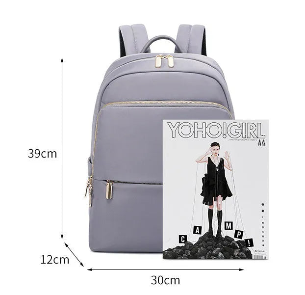 Black Oxford cloth women's large capacity backpack with anti-theft features.