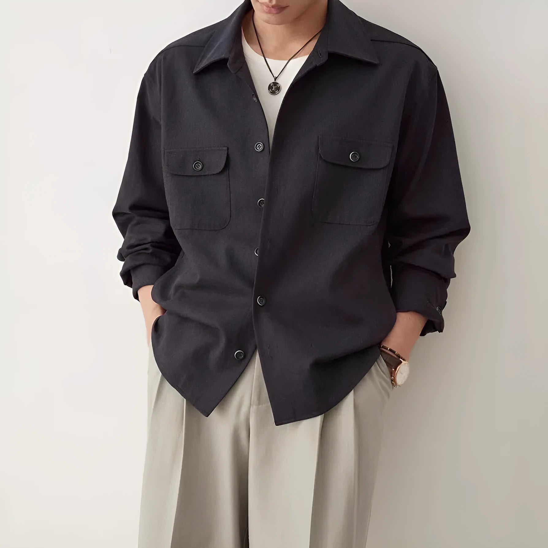 Men's light sand rice casual shirt with a cotton fabric lapel and long sleeves, laid flat.