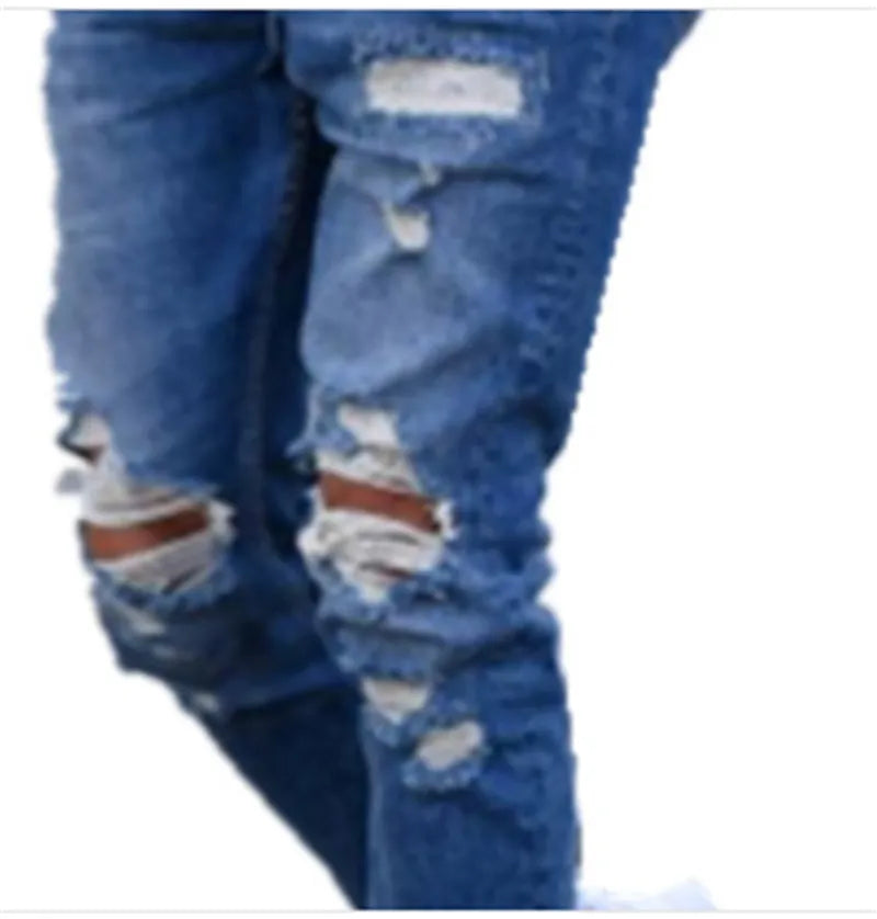 Men's deep blue cotton jeans laid flat, showing the five-pocket design and button fly.