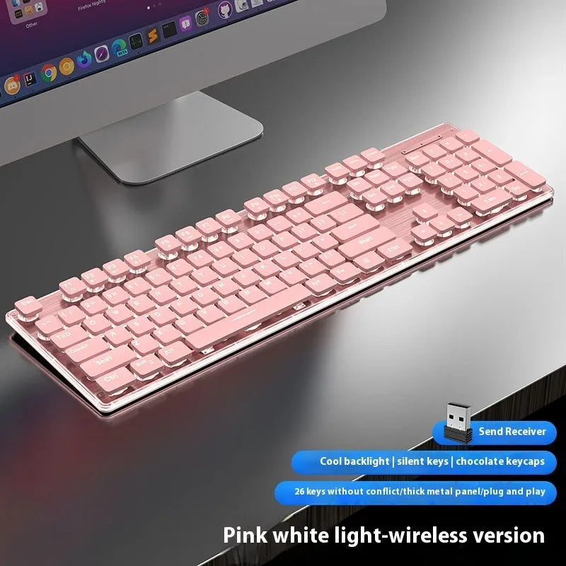 Wireless mute Bluetooth keyboard in cherry blossom pink colour showing mute button and wireless connectivity