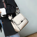 Women's genuine leather retro messenger bag in horizontal square shape with multiple interior compartments