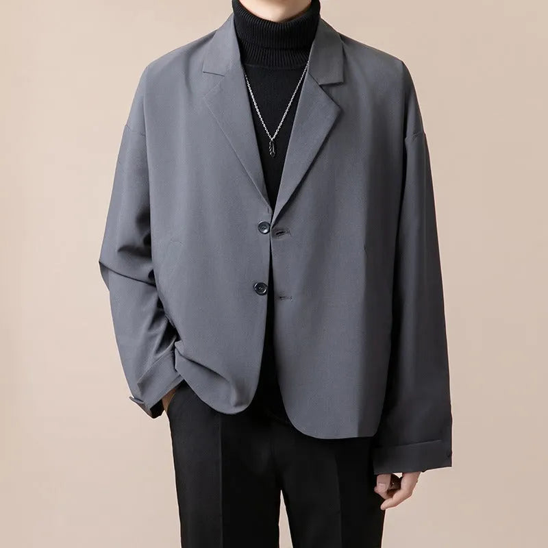 Loose fit casual suit jacket in polyester blend fabric showing four colour options: apricot, black, brown, and dark grey