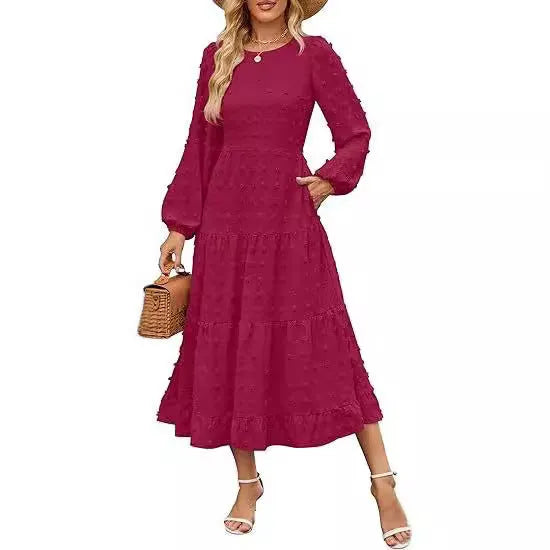 Women's long sleeve autumn dress with ruffle sleeves and high waist in a solid colour.